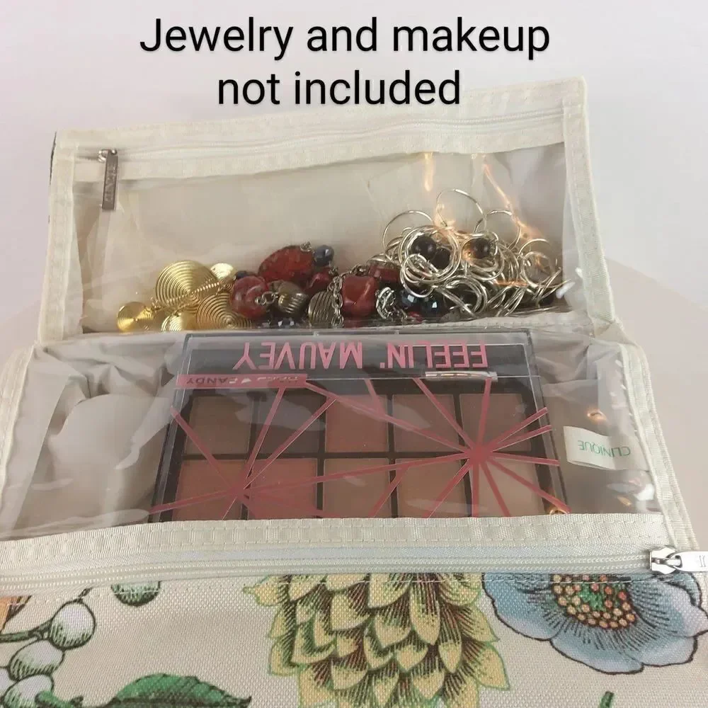 Clinique cream floral print fold over makeup / jewelry bag.